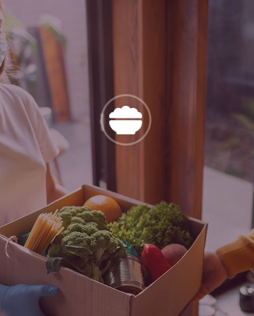 Woman delivering groceries in box